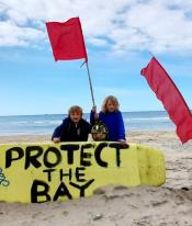 Protect the Bay banners and protest Protect the Bay banners and protest